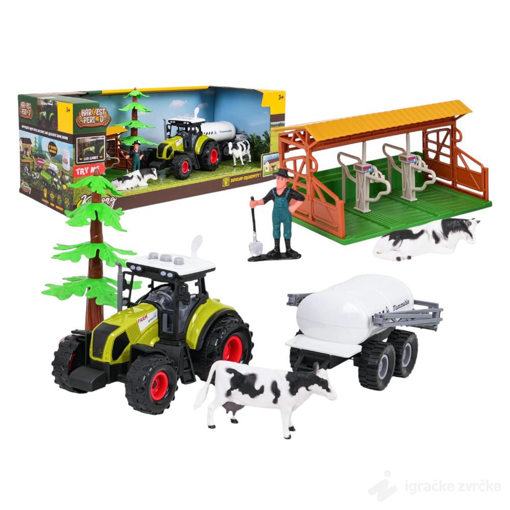 Traktor i farma za uzgoj krava